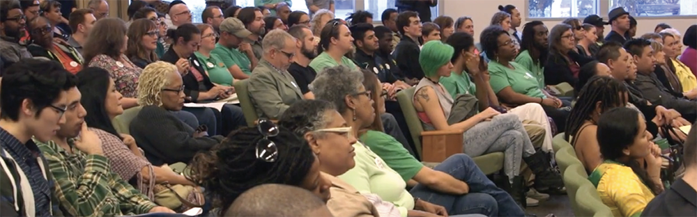 Community members attend city council meeting